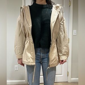 PRADA hooded raincoat in Tan. Jacket with elastic cinched waist. Front zipper.